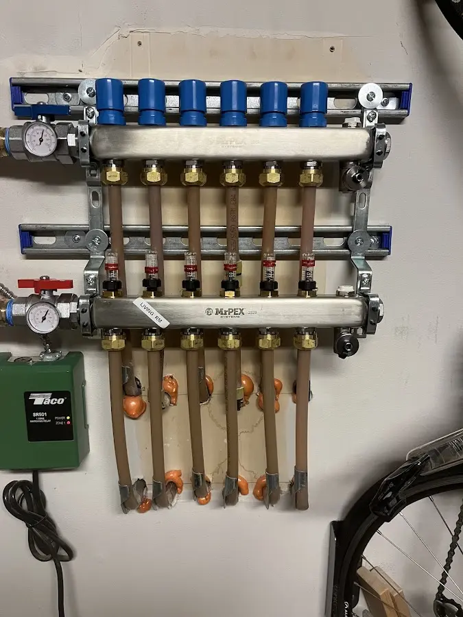 Plumber performing Gas Line Installation at a residential property in Port Vue